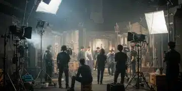 Behind-the-scenes of a bustling Korean drama set with crew and actors